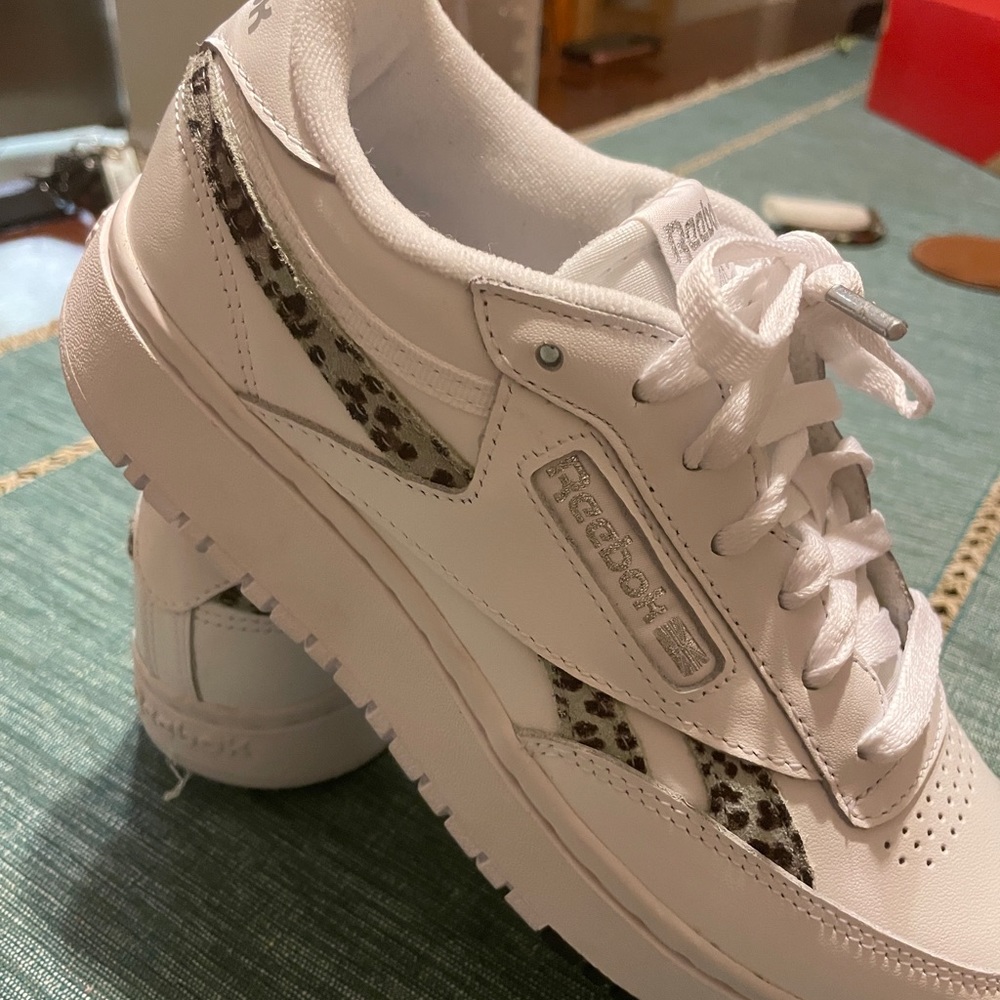Size 8 white Reeboks with leopard print stripes